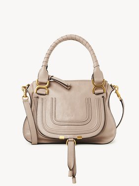 Bolso pequeño Marcie de cuero brillante Cuero de becerro brillante
Deep Beige