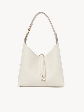 Small Marcie hobo bag in grained leather Grained calfskin
Misty Ivory