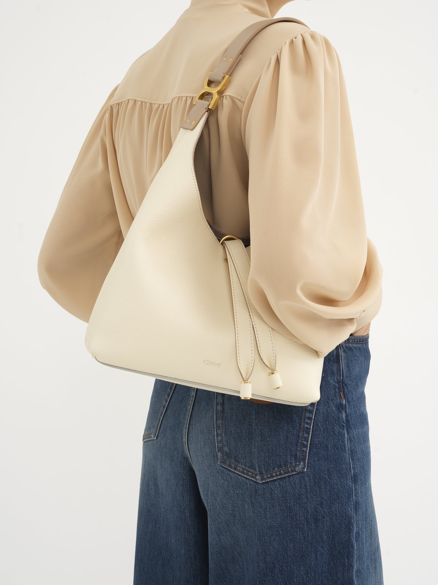 Small Marcie hobo bag in grained leather Grained calfskin
Misty Ivory Back view of the product