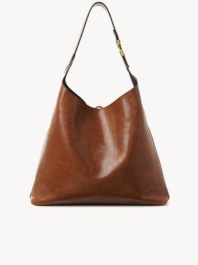 Marcie hobo bag in shiny leather Shiny calfskin
Clay Brown Top view of the product