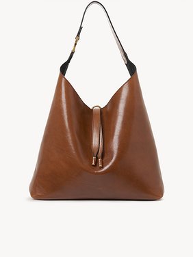 Marcie hobo bag in shiny leather Shiny calfskin
Clay Brown