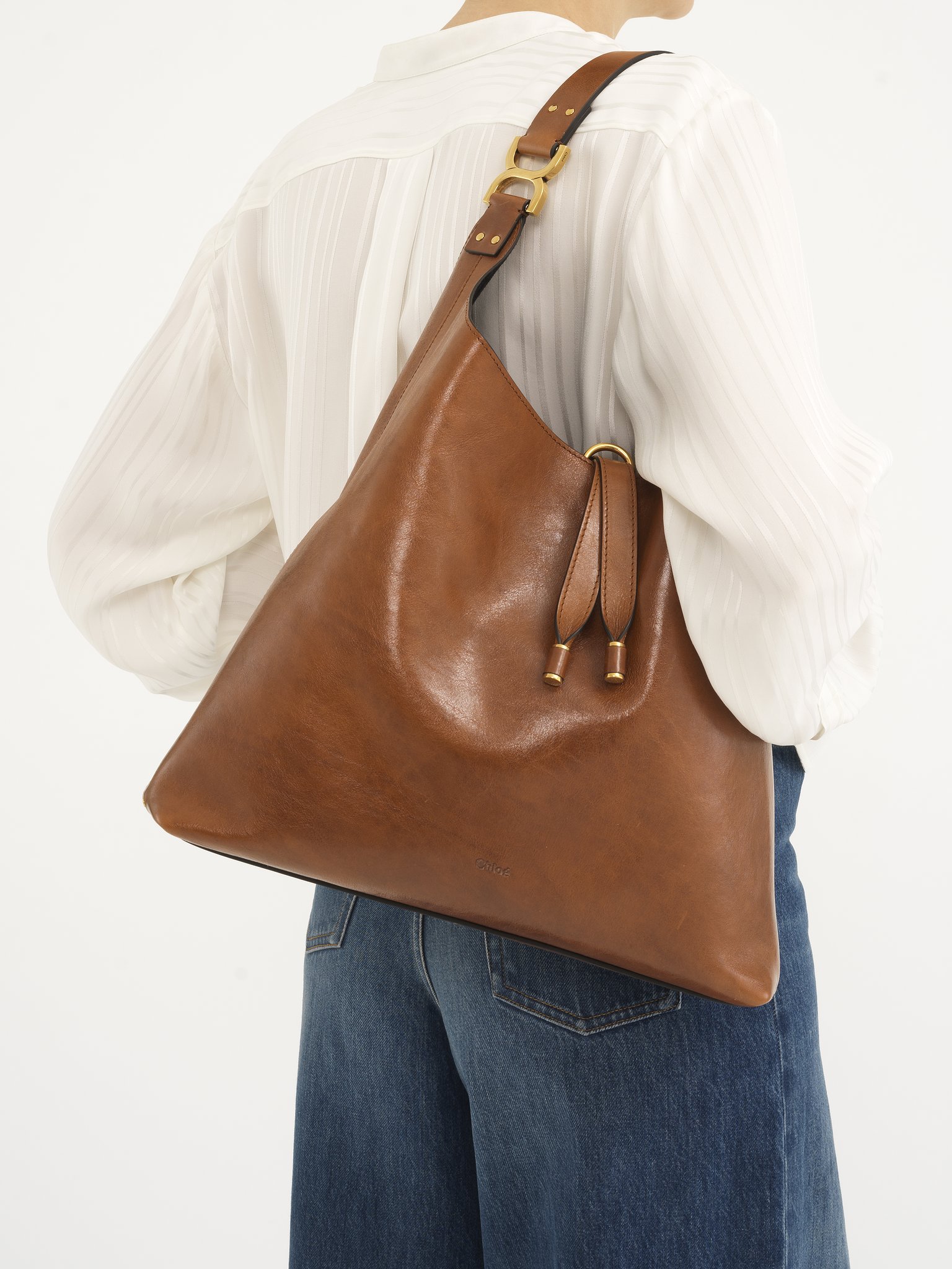 Marcie hobo bag in shiny leather Shiny calfskin
Clay Brown Back view of the product