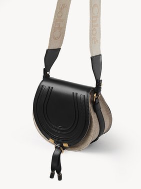 Small Marcie saddle bag in linen & soft leather Linen canvas & smooth calfskin
Black Product detail