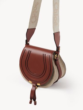 Small Marcie saddle bag in linen & soft leather Linen canvas & smooth calfskin
Sepia Brown Product detail