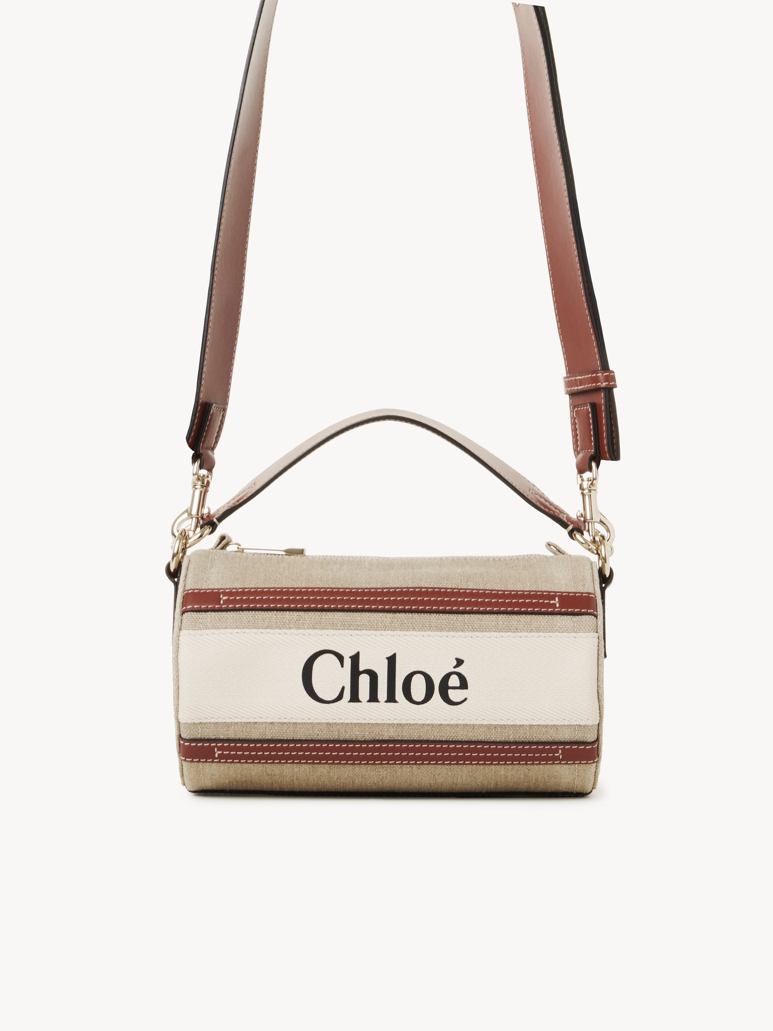 Woody tube shoulder bag in linen & soft leather Chloé logo webbing, linen canvas & calfskin
White & Brown