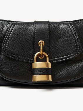 The 99 shoulder bag in grained leather Shiny grained calfskin
Black Front view of the product being worn