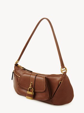 The 99 shoulder bag in grained leather Shiny grained calfskin
Clay Brown Product detail