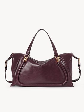 Paraty 24 bag in shiny leather Natural shiny calfskin
Dimness Purple Top view of the product