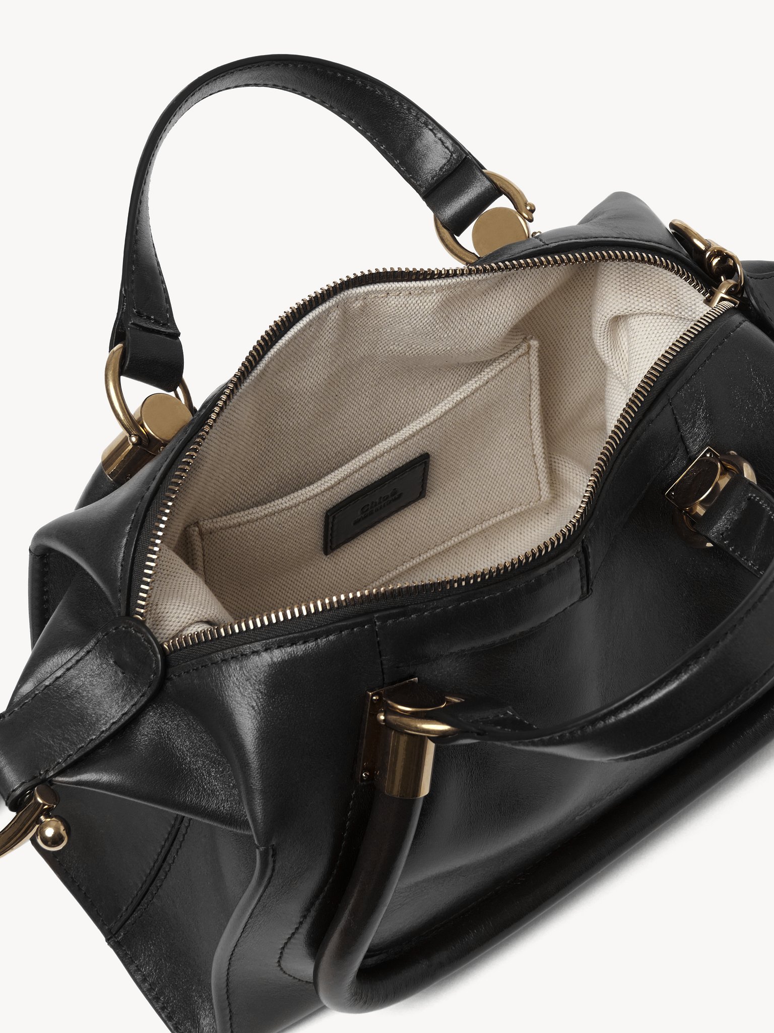 Small Paraty 24 bag in shiny leather Natural shiny calfskin
Black 