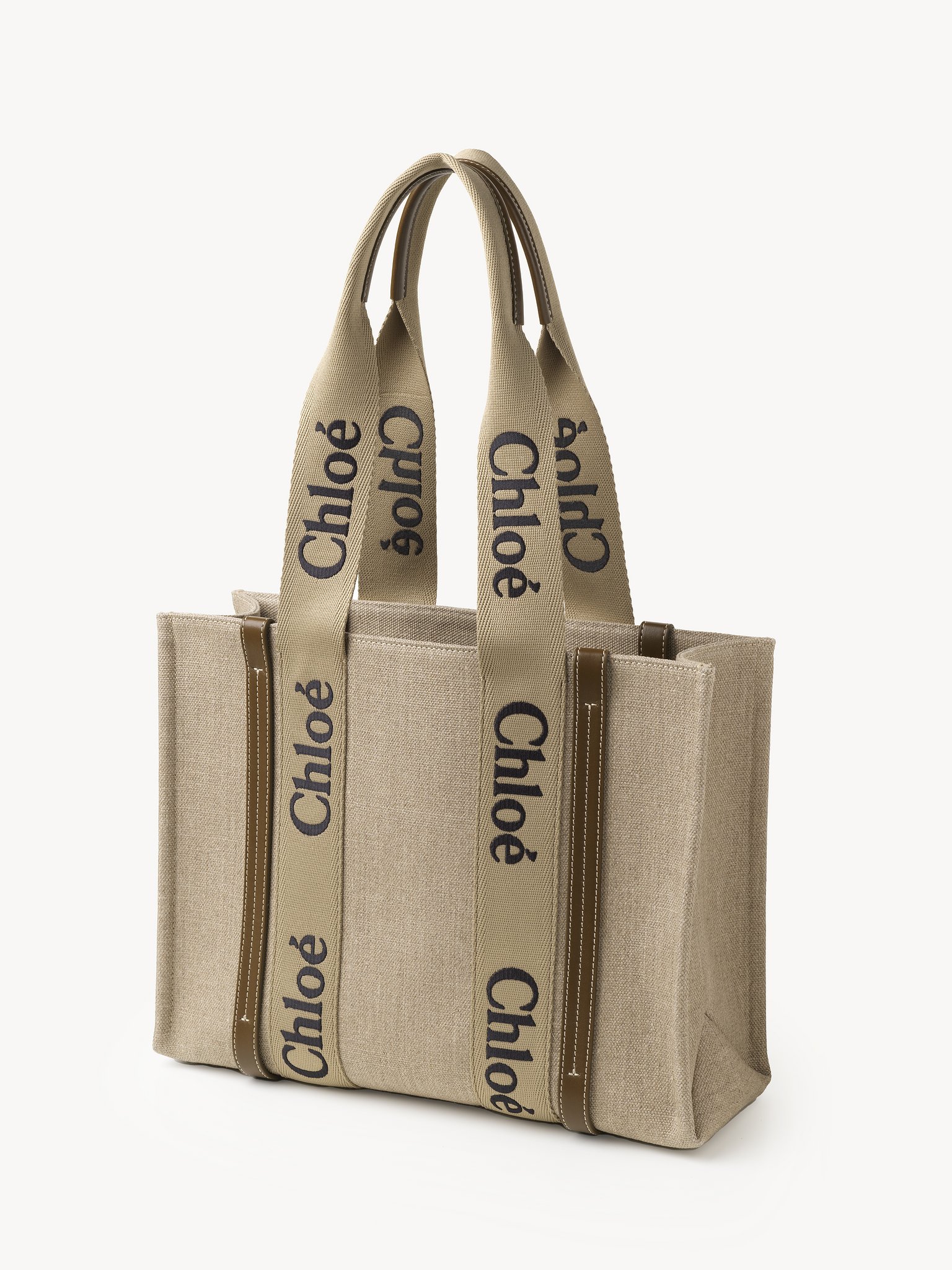 Woody tote bag in linen Linen canvas, calfskin & webbing
Bronze Brown Product detail