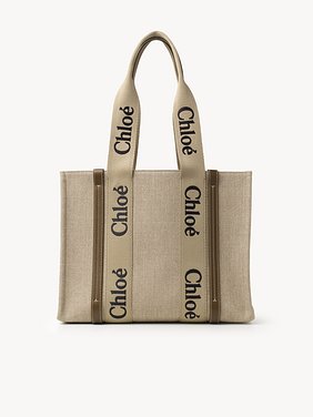 Woody tote bag in linen Linen canvas, calfskin & webbing
Bronze Brown