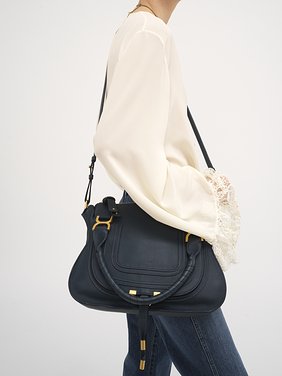 Marcie bag in grained leather Grained calfskin
Tapestry Blue [*** acc_altImage_shotH ***]