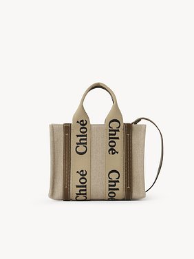 Small Woody tote bag in linen Linen canvas, calfskin & webbing
Bronze Brown