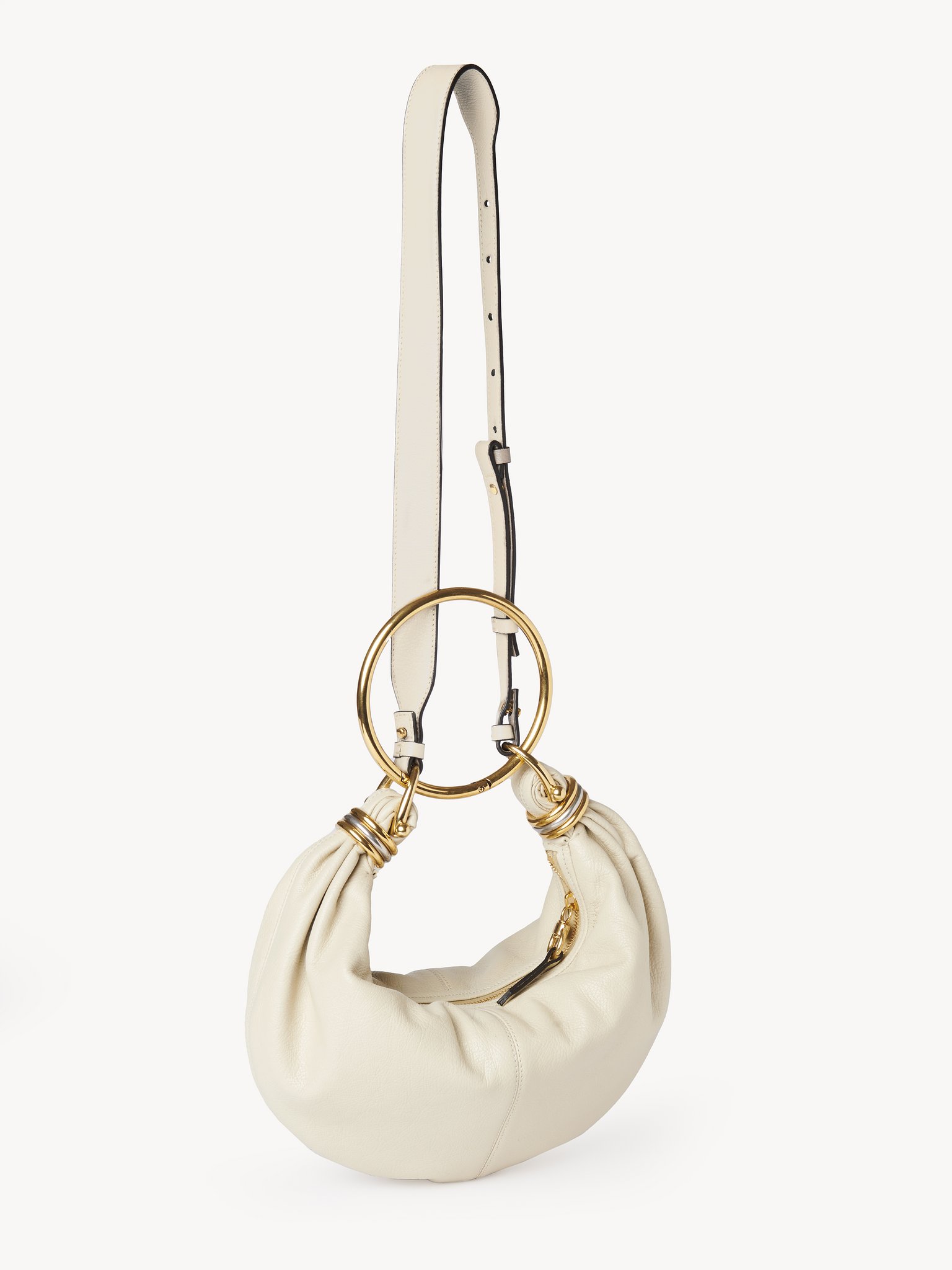 Small Bracelet hobo bag in grained leather Shiny grained calfskin
Vegetal Beige Product detail