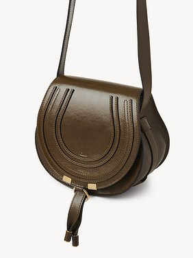 Small Marcie saddle bag in shiny leather Shiny calfskin
Dark Khaki Product detail