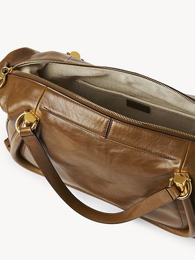 Paraty 24 bag in shiny leather Natural shiny calfskin
Bronze Brown 