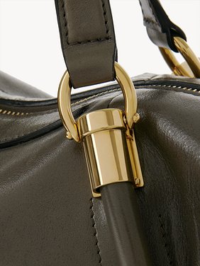 Small Paraty 24 bag in shiny leather Natural shiny calfskin
Flannel Grey Front view of the product being worn