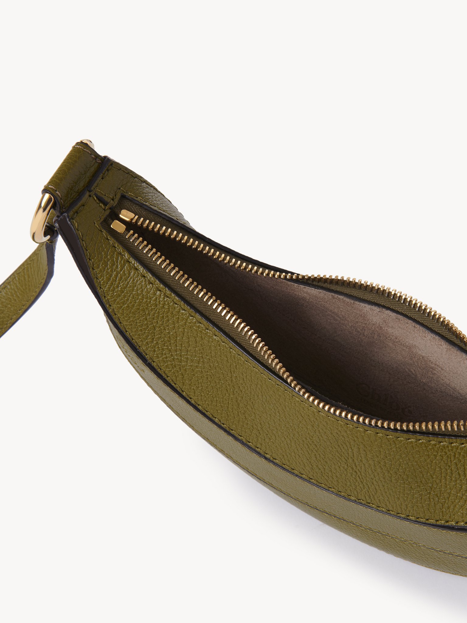 Banana cross-body bag in grained leather Shiny grained calfskin
Sweet Khaki Front view of the product being worn