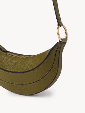 Banana cross-body bag in grained leather Shiny grained calfskin
Sweet Khaki Front view of the product being worn