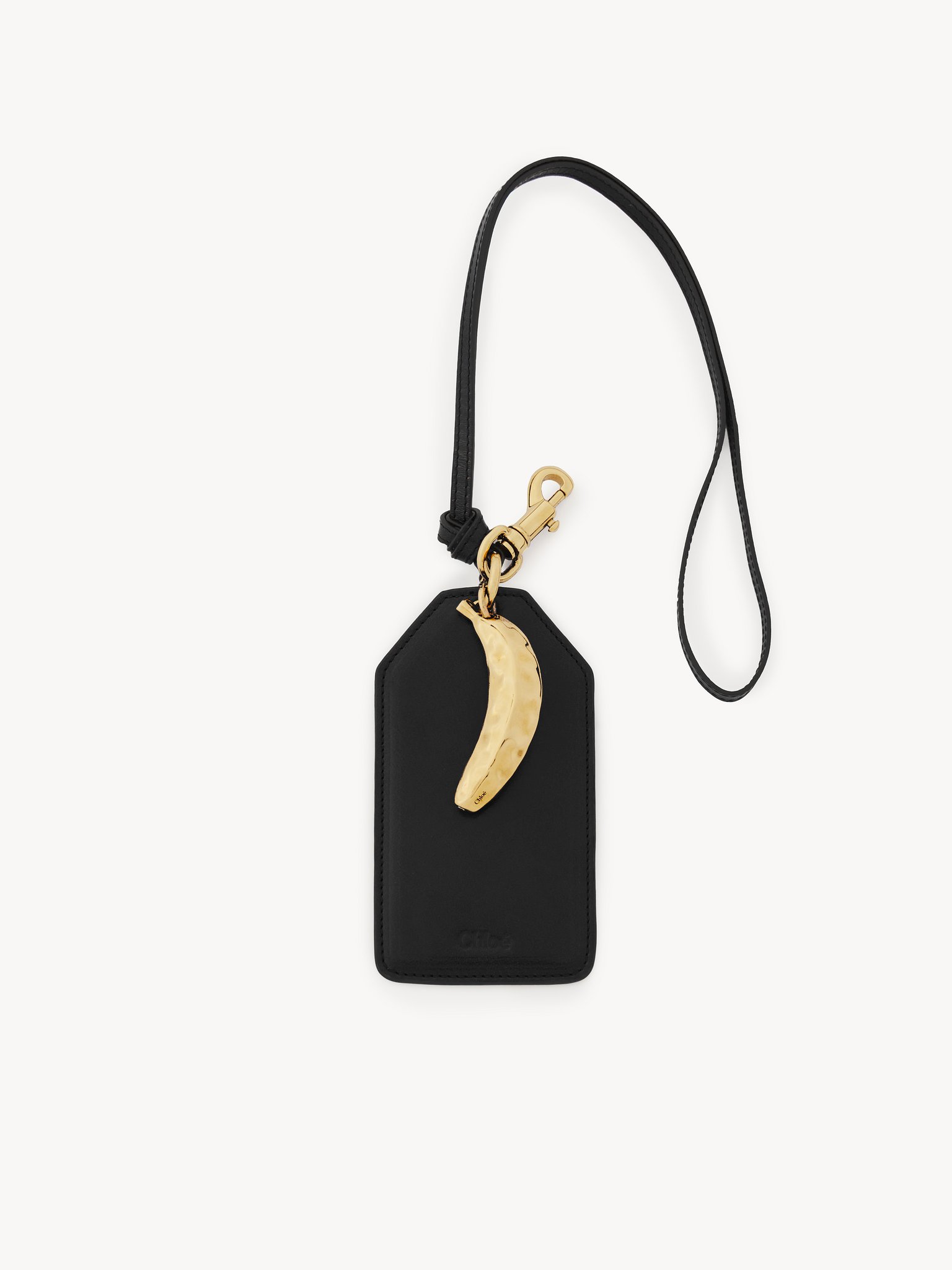 Banana tag in shiny leather Natural shiny buffalo leather
Black