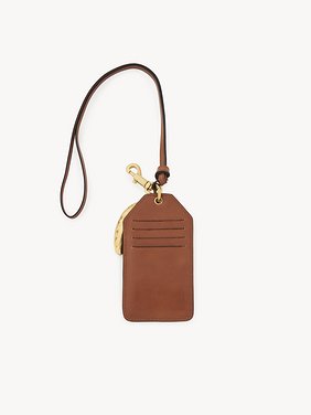 Banana tag in shiny leather Natural shiny buffalo leather
Clay Brown 