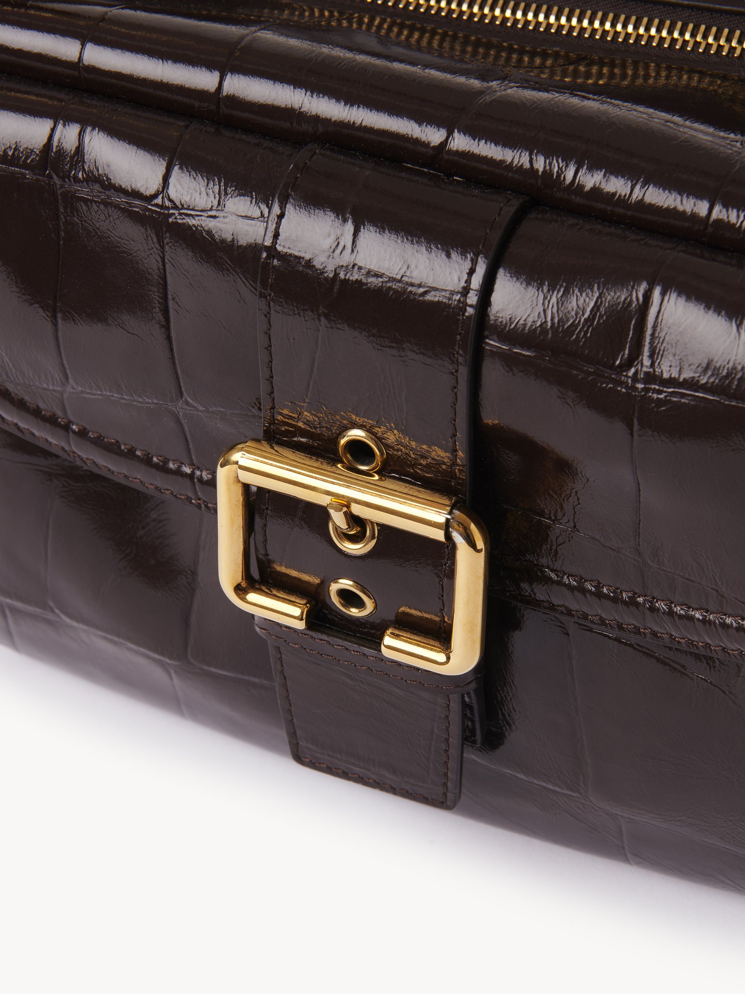 Camera bag in croco-effect leather Croco-effect calfskin
Kohl Brown Front view of the product being worn