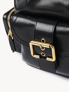 Camera Bucket bag in shiny leather Natural shiny buffalo leather
Black Front view of the product being worn