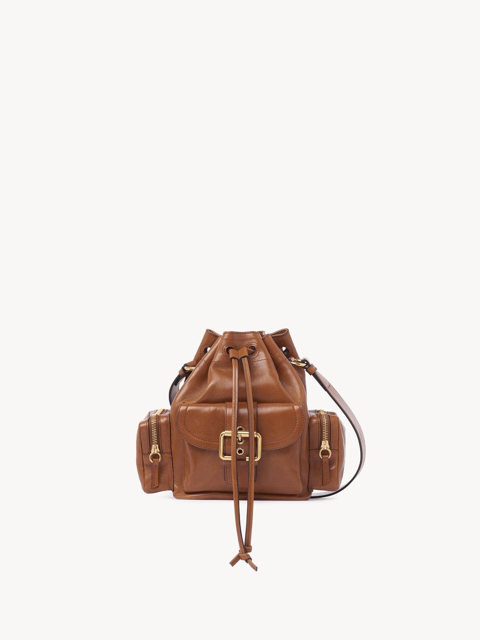 Camera Bucket bag in shiny leather Natural shiny buffalo leather
Clay Brown