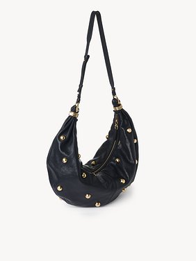 Large Bracelet Hobo bag in grained leather with studs Shiny grained calfskin with oversized studs
Evening Blue Product detail