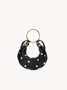 Small Bracelet Hobo bag in grained leather with studs Shiny grained calfskin with oversized studs
Black Top view of the product