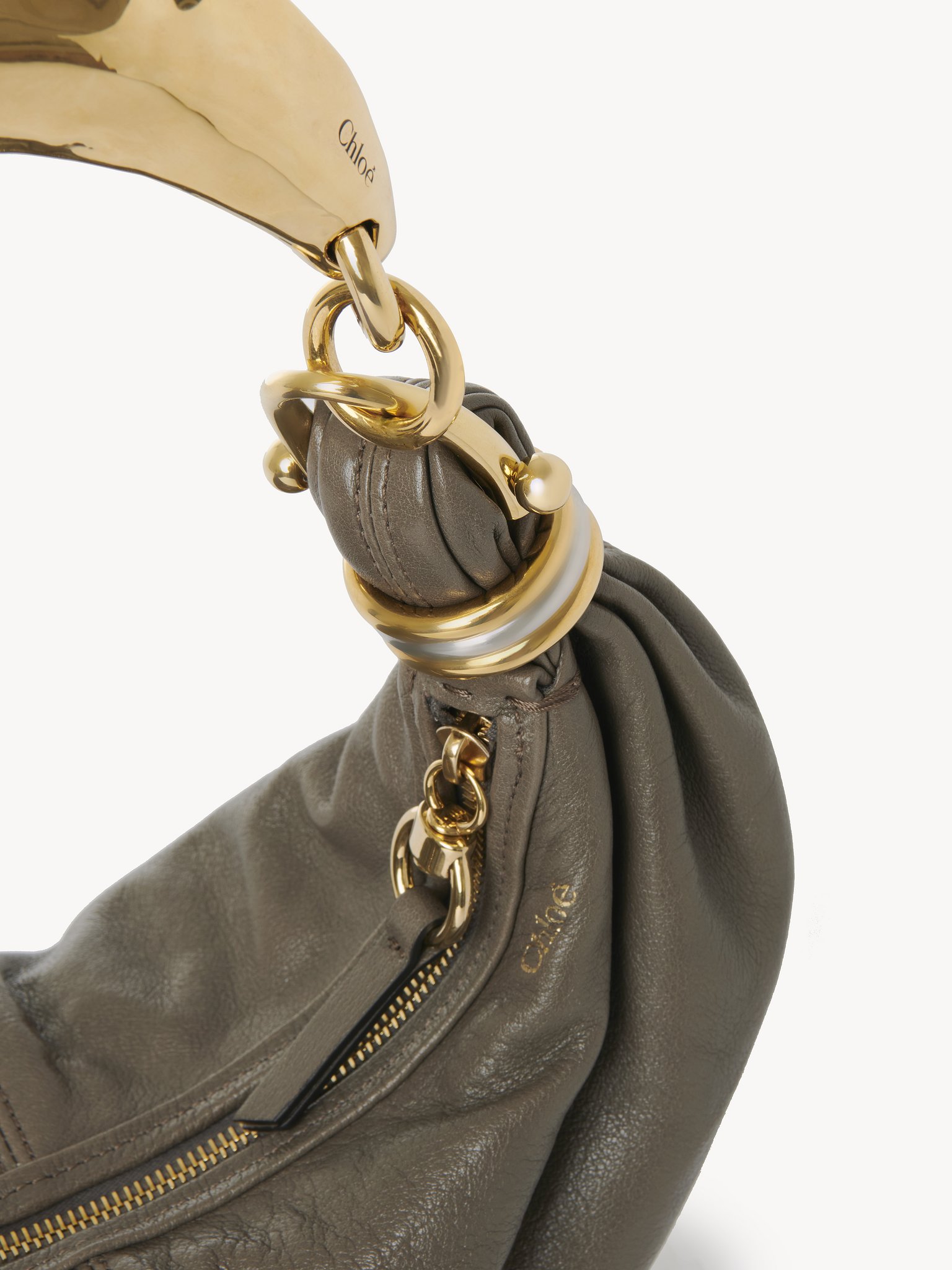 Small Bracelet Hobo Bag in grained leather Grained buffalo leather
Flannel Grey Front view of the product being worn