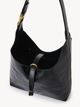 Small Marcie hobo bag in croco-effect leather Croco-effect calfskin
Black Front view of the product being worn