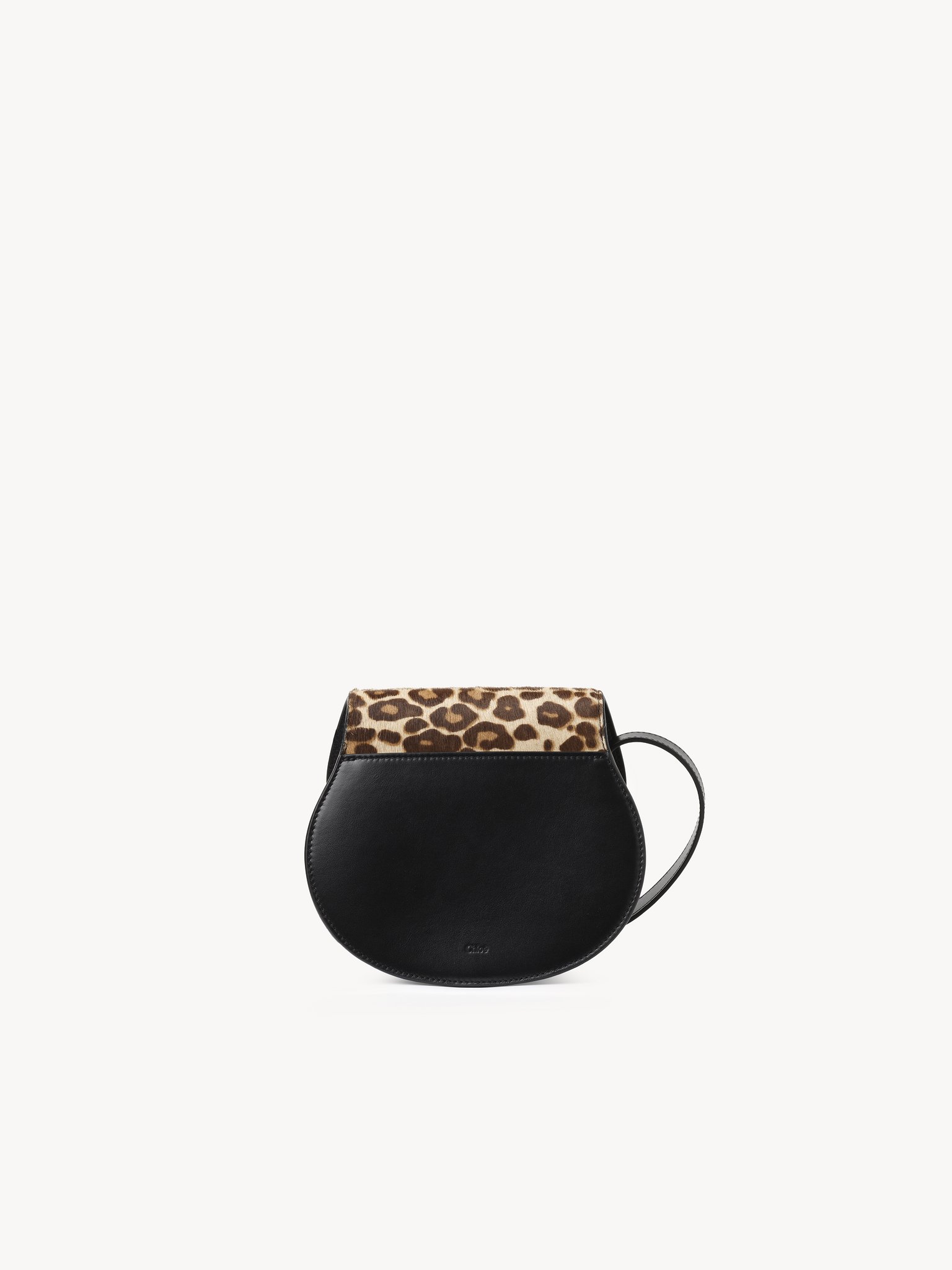 Small Marcie saddle bag in leopard-print leather Leopard-print pony calfskin
Jungle Brown Top view of the product