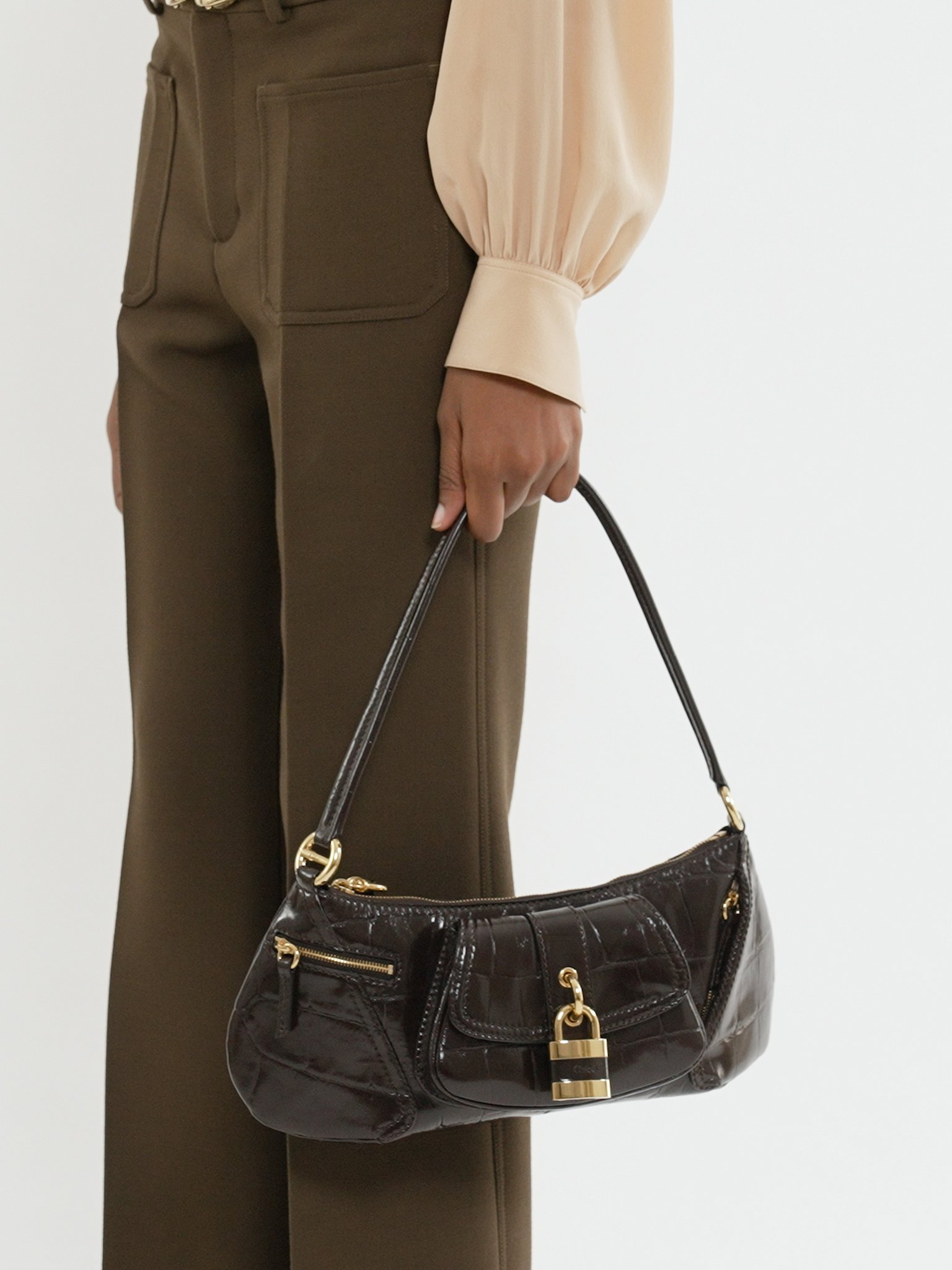 The 99 shoulder bag in croco-effect leather Croco-effect calfskin
Kohl Brown [*** acc_altImage_shotV ***]