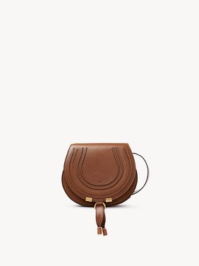 Small Marcie saddle bag in shiny leather Shiny calfskin
Clay Brown