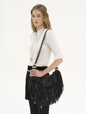 Small Bracelet Hobo bag in fringed leather Fringed buffalo leather with metal ornaments
Black Back view of the product