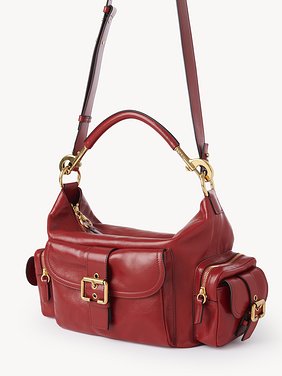 Camera bag in shiny leather Natural shiny buffalo leather
Red Flame Product detail