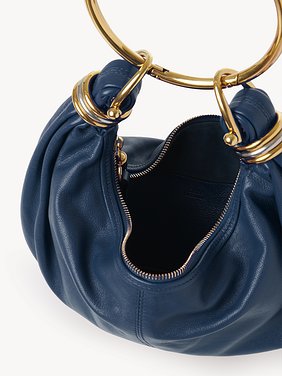 Small Bracelet Hobo bag in grained leather Shiny grained calfskin
Tapestry Blue 