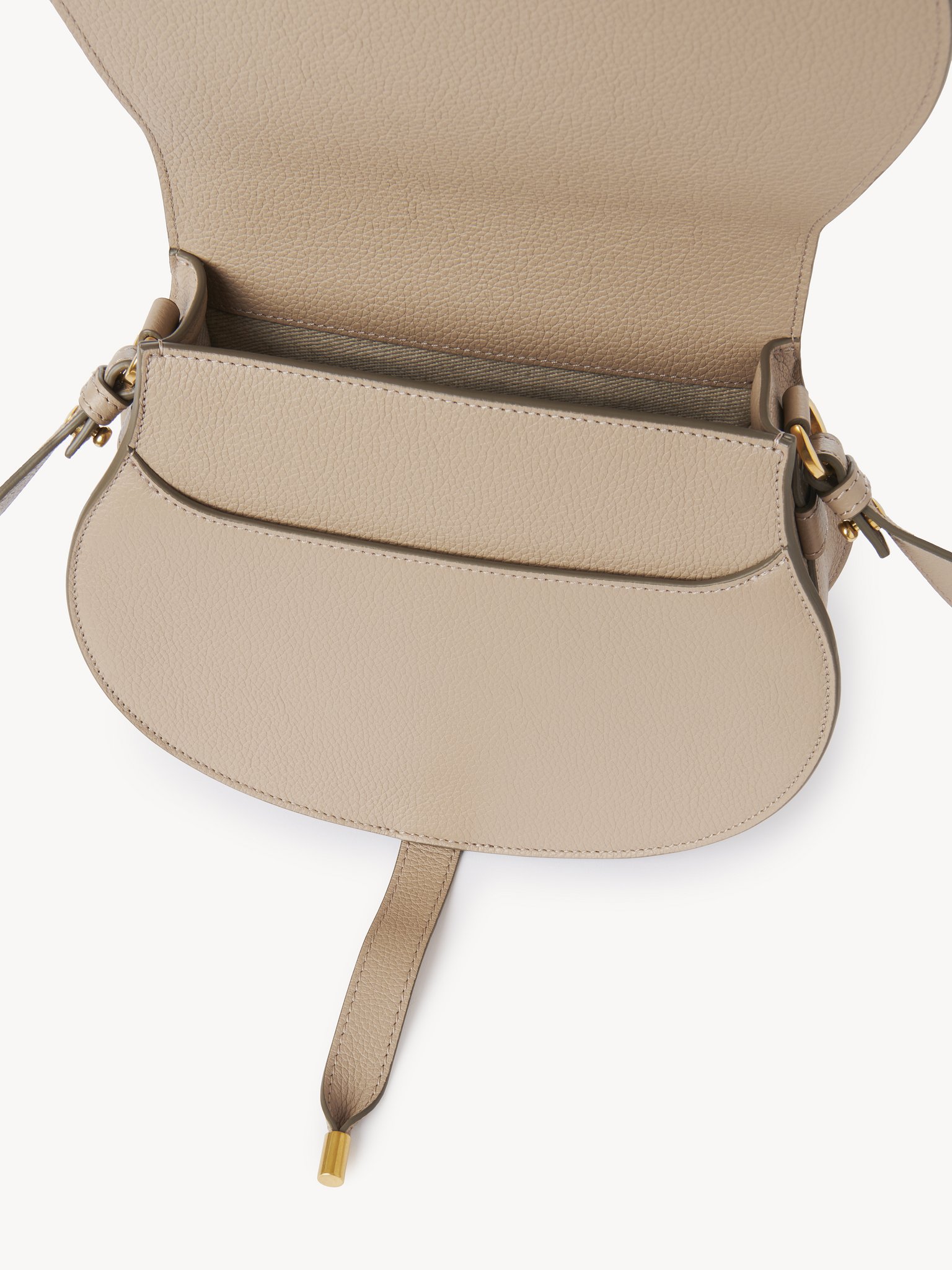 Marcie saddle bag in grained leather Grained calfskin
Boyish Brown Front view of the product being worn