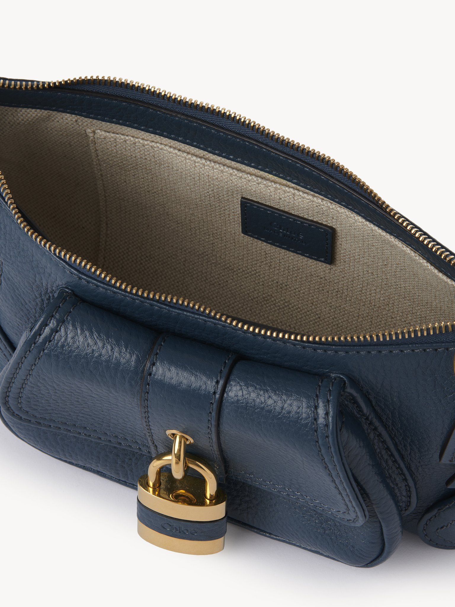 The 99 shoulder bag in grained leather Shiny grained calfskin
Tapestry Blue Front view of the product being worn