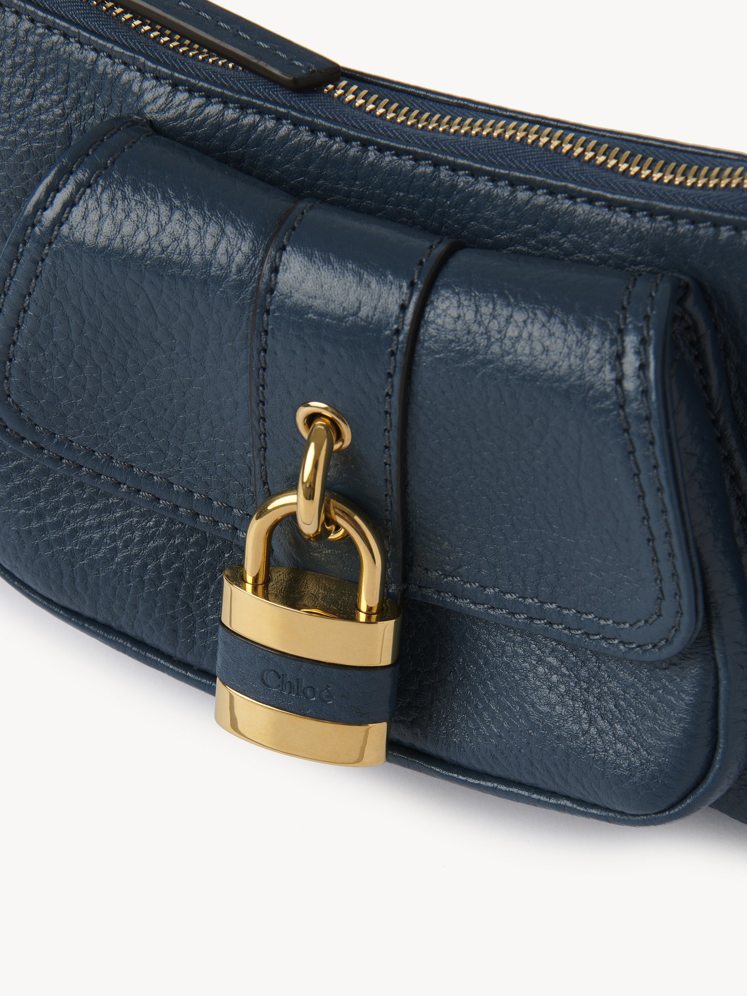 The 99 shoulder bag in grained leather Shiny grained calfskin
Tapestry Blue Front view of the product being worn