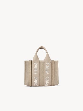 Mini Woody tote bag in linen & leather Embroidered logo webbing, linen canvas & shiny calfskin
Boyish Brown Top view of the product