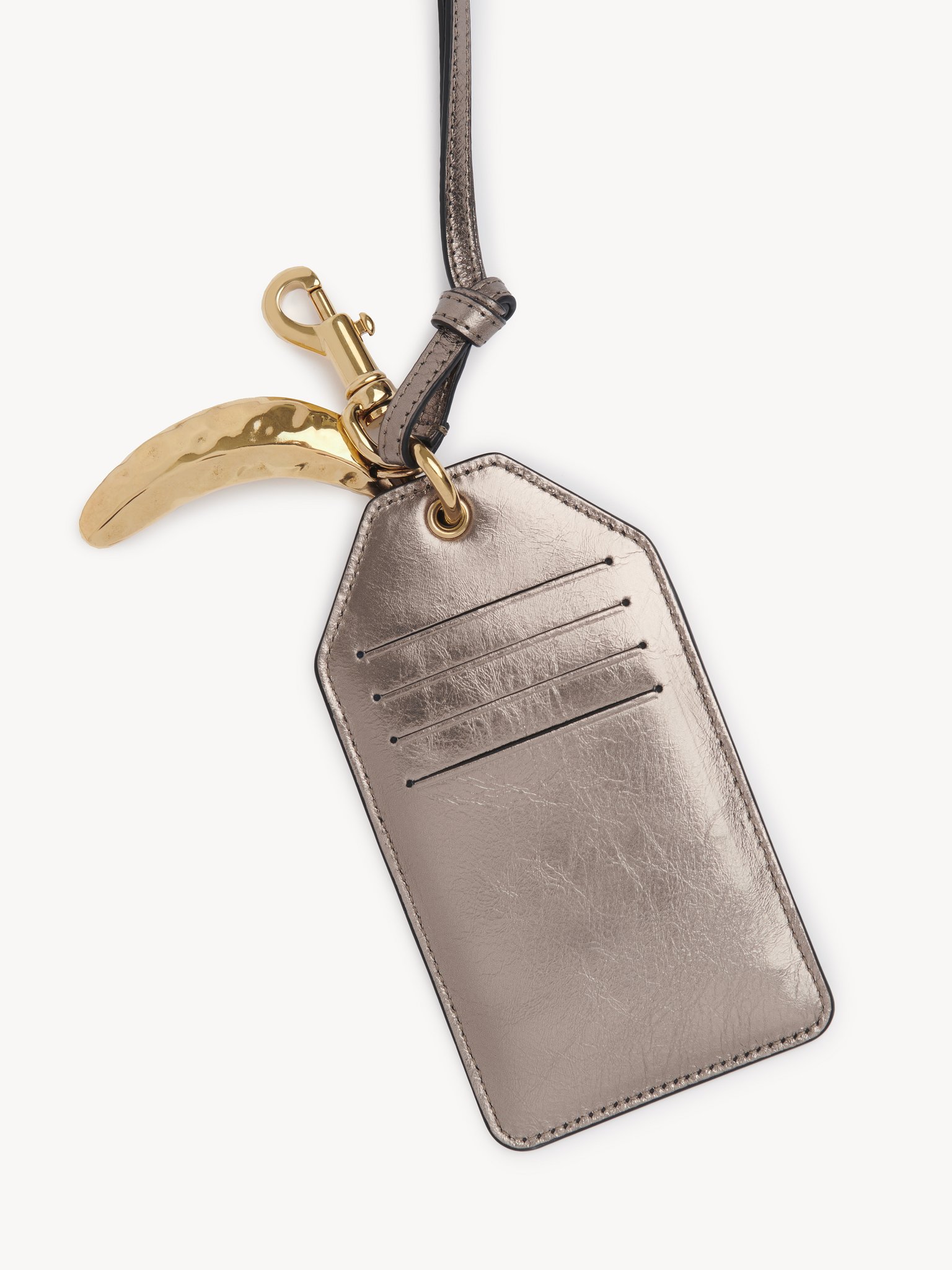 Chloé Symbols Banana tag in metallised leather Metallised calfskin
Shiny Grey Back view of the product