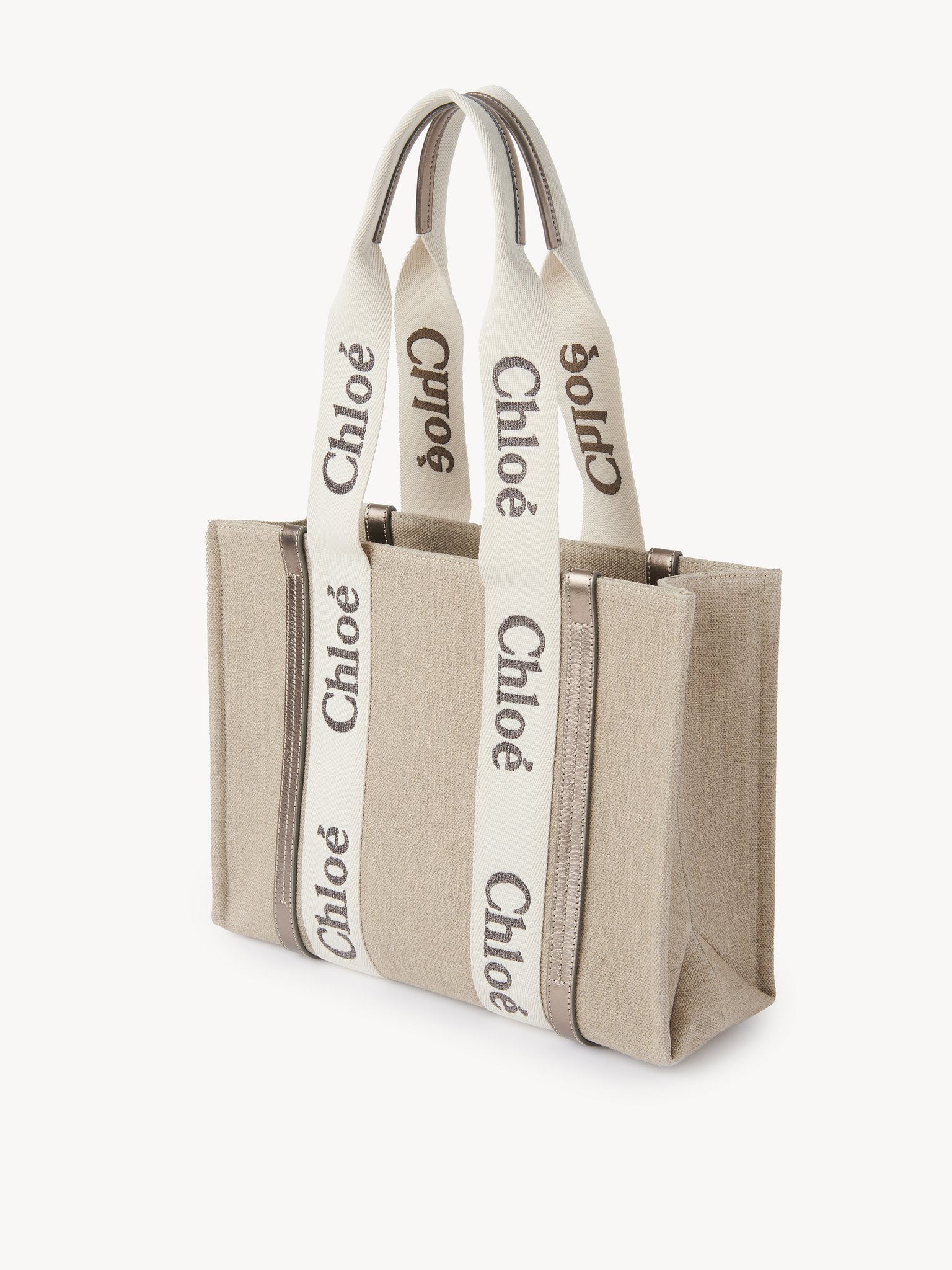 Woody tote bag in linen & leather Linen & metallized calfskin
Shiny Gray Product detail