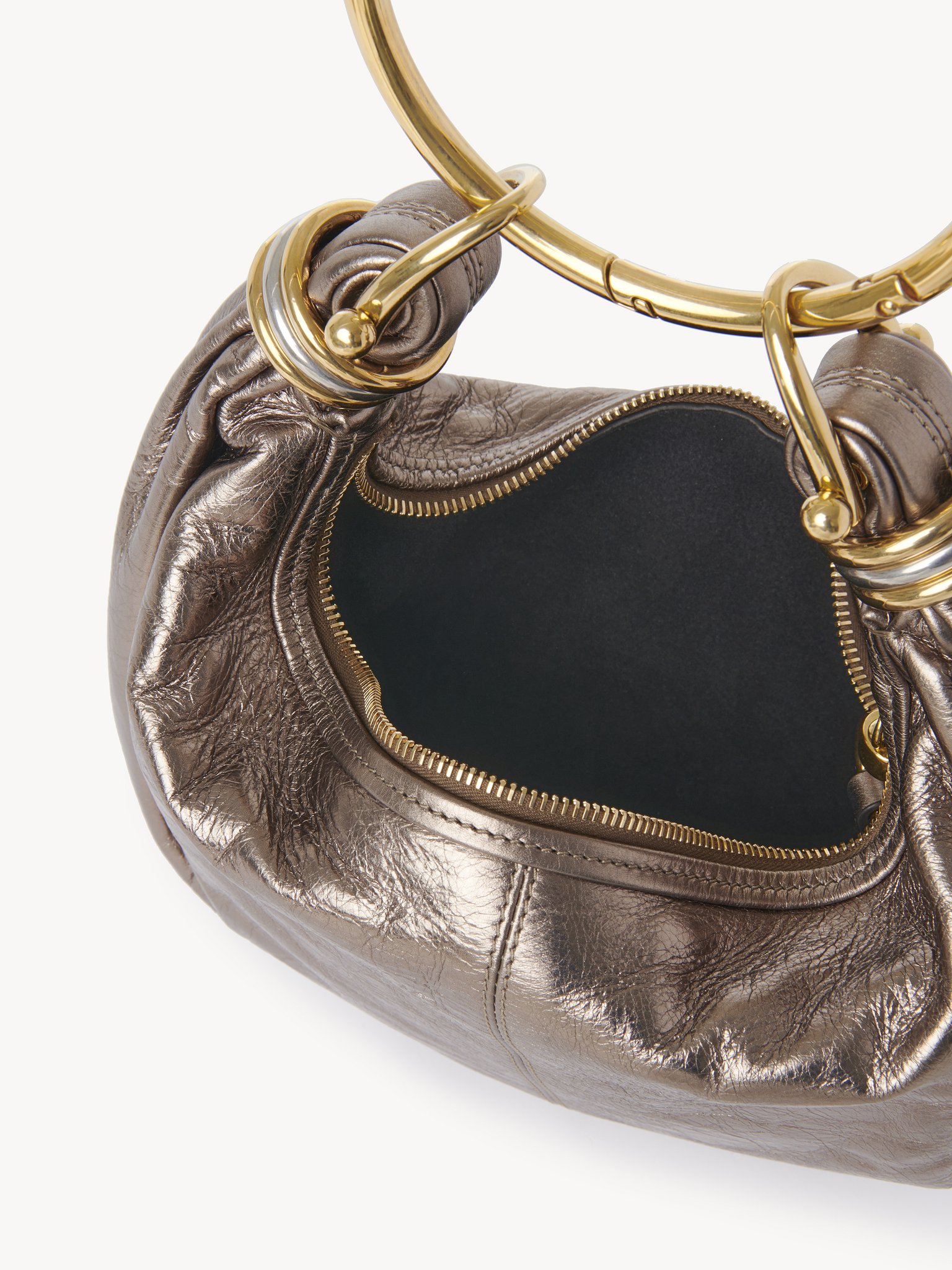 Small Bracelet Hobo bag in metallized leather Metallized calfskin
Shiny Gray Front view of the product being worn