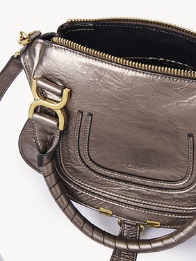 Small Marcie bag in metallized leather Metallized calfskin
Shiny Grey Front view of the product being worn