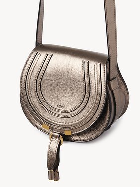 Small Marcie saddle bag in metallized leather Metallized calfskin
Shiny Grey Product detail