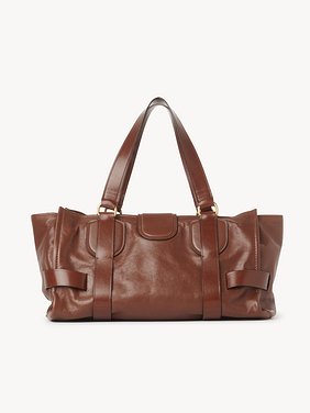 Kerala 25 handbag in soft leather Smooth & natural calfskin
Dark Ebony Top view of the product