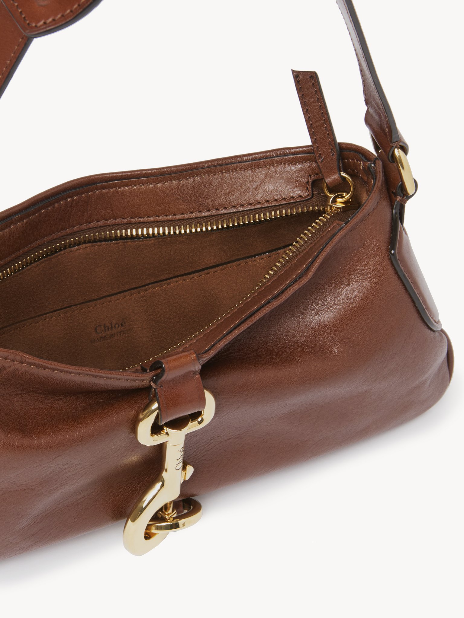 Kerala 25 shoulder bag in soft leather Smooth & natural calfskin
Dark Ebony Front view of the product being worn