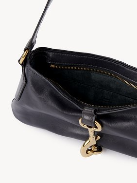 Kerala 25 shoulder bag in soft leather Smooth & natural calfskin
Black Navy Front view of the product being worn